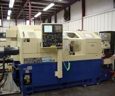 1 1/2 , Tsugami, No. MU38SY, Fanuc 18iTA, 12' Bar Feed,Twin Tureet,6 Live pos.,2005